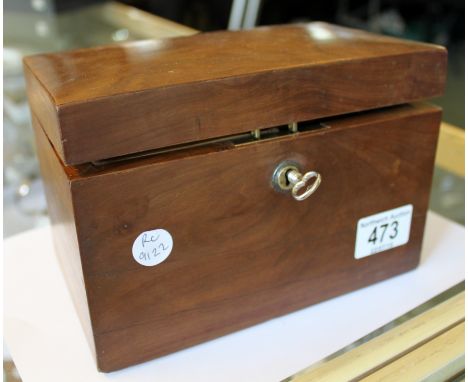 Double walnut hinged tea caddy with twin lidded compartments and lock with two keys
