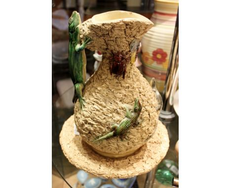 Manuel Mafra Caldes Majolica ewer c1885 in naturalistic design with lizards and insects applied, on saucer, lacking lid