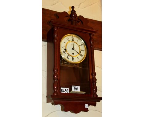 Wood cased mechanical chiming wall clock