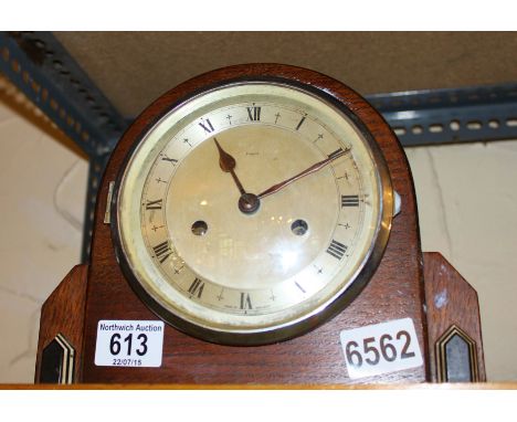 Enfields oak cased Art Deco chiming mantel clock