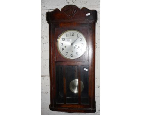 Oak cased wall clock