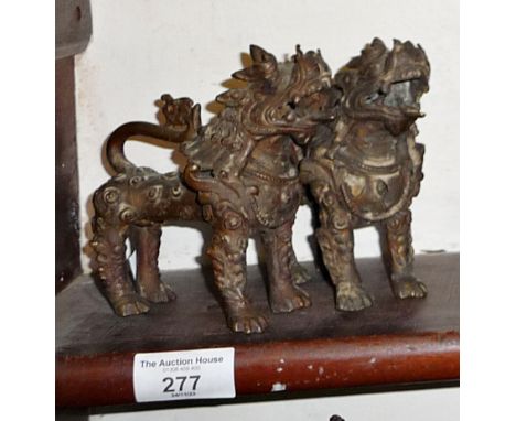 Pair of early Chinese bronze Kylin dogs, 12cm high x 12cm long