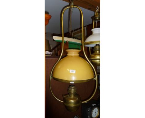 Large Victorian brass hanging oil lamp with yellow glass shade