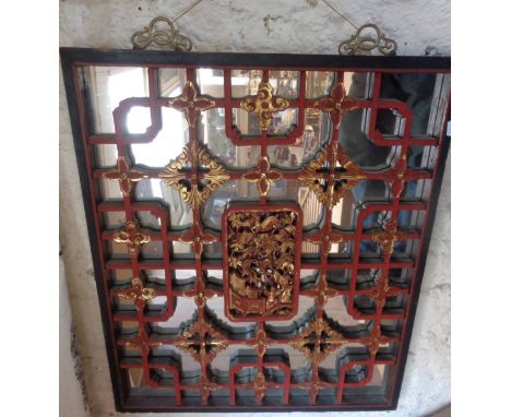 Chinese carved wood, lacquered and gilded wall mirror, 76cm x 63cm