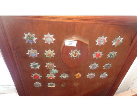 Part collection of assorted Fire Brigade enamel badges mounted in oak frame