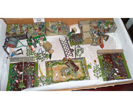 Britains lead garden, inc. rockery, walls, square section, pergola, man with roller, old couple on a bench, man with wheelbar