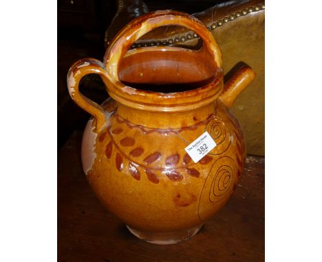 A large Sampigny les Orange studio pottery wine pitcher