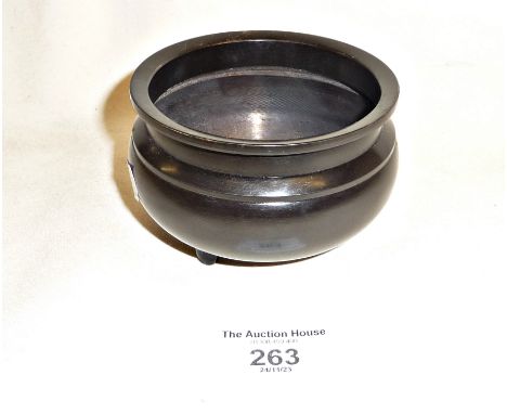 Small Chinese bronze censer on three feet, 9cm diameter x 6cm high