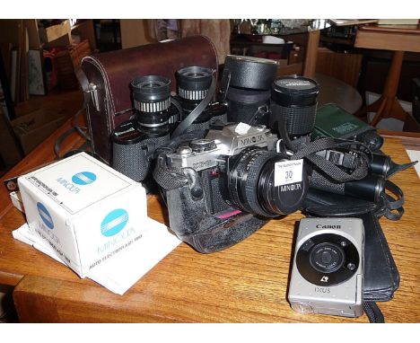 A Minolta XG-M camera, a Canon IXUS camera and three pairs of binoculars including Horizon Zoom