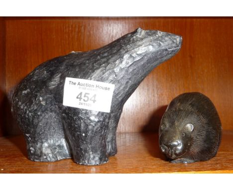 Inuit stone carving of a polar bear and a resin beaver