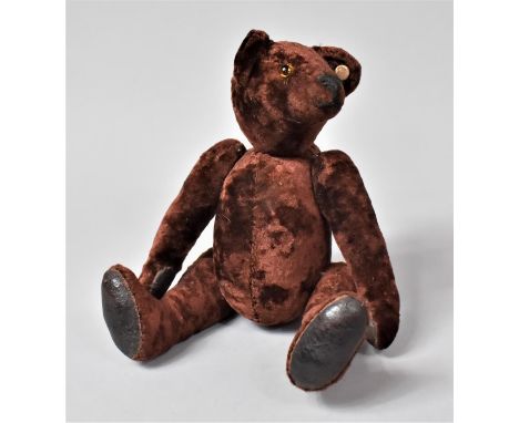 A Reproduction Teddy Bear in the Manner of Steiff, 23cm high 