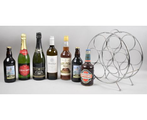 A Collection of Sparkling Wines, Commemorative Beers and a Circular Wine Rack 