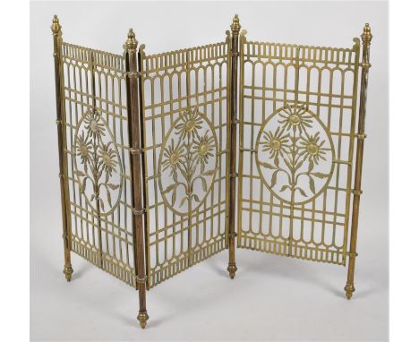 A Late Victorian/Edwardian Brass Three Fold Fire Screen of Trellis Form with Central Floral Decoration, 73.5cm high, In need 