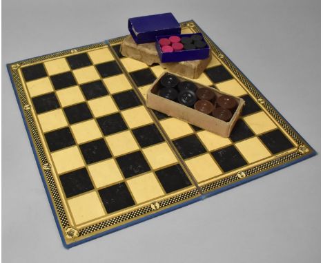 A Vintage Chess Board Together with Two Sets of Draughts Pieces 
