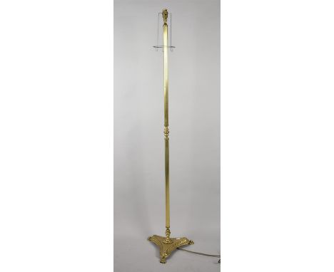 A Mid 20th Century Brass Standard Lamp with Trefoil Base and Claw Feet 
