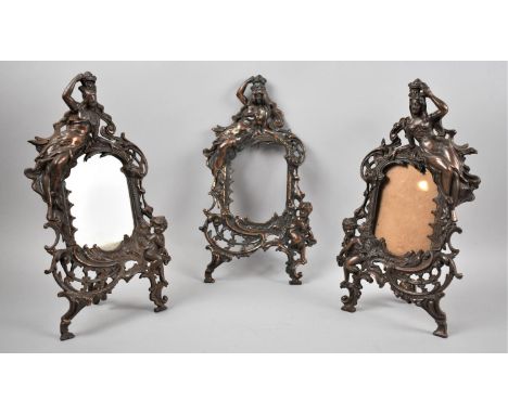 A Set of Three Easel Backed Art Nouveau French Bronzed Photo Frames, the Finials with Reclining Maidens Holding Crown, 35cm h