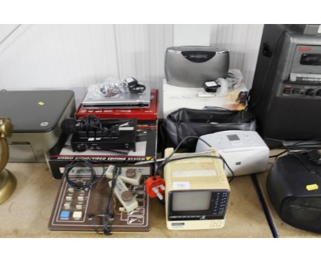 A Durabrand compact DVD player with original box, a Bush kitchen radio with original box, an Edit channel mixer VMX3000 with 
