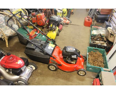 A Rover rotary lawn mower with Briggs & Stratton Quattro 40 engine 