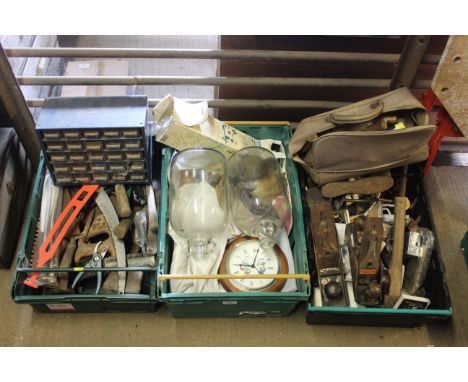 Three plastic tray boxes containing a variety of items to include a Raaco small nest of drawers, hand saws, two glass demi jo
