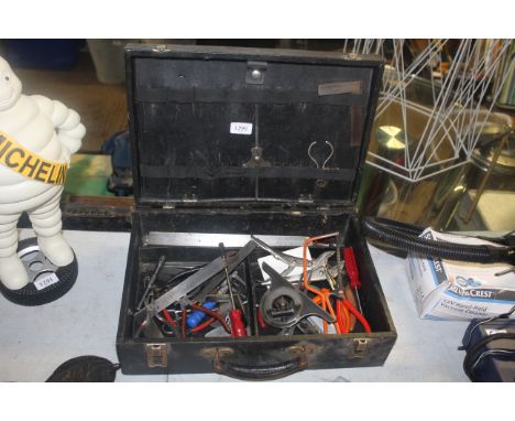 A briefcase and contents of various tools to include Mole grips, steel measure etc.
