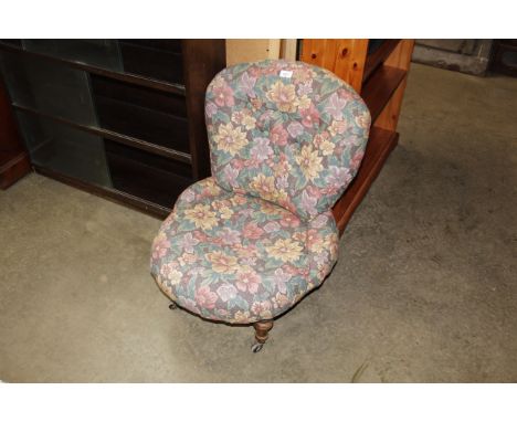 An upholstered button back nursing chair 