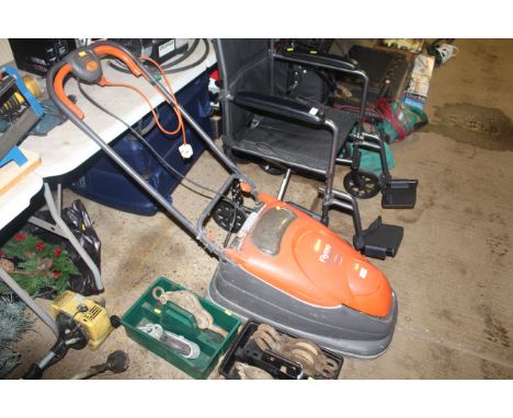 A Flymo Turbo Compact 330 Vision electric hover mower (lacking cable)
