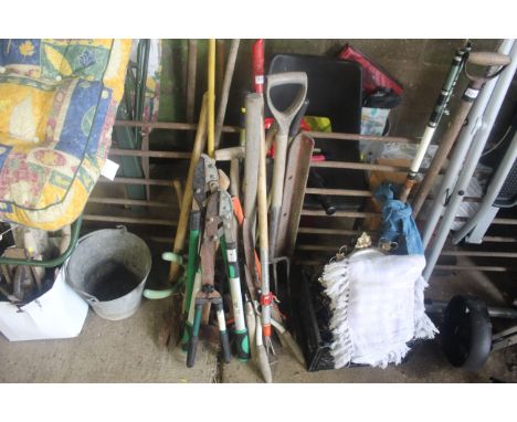 A quantity of various gardening tools to include digger fork, garden shears, A Wolf tools hand cultivator, axe etc.