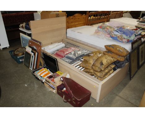 A light oak effect IKEA single bedframe and under bed storage drawers