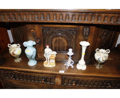 A quantity of various decorative china to include painted vases, a candlestick in the form of a cherub etc