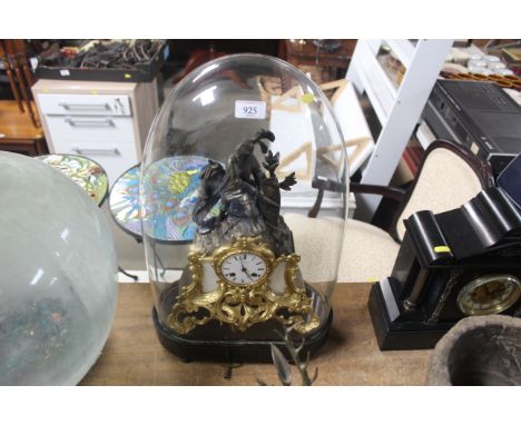 A French Leroy of Paris mantel clock decorated with a figure of a knight, under glass dome 