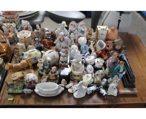 A collection of money boxes, trinket boxes etc.