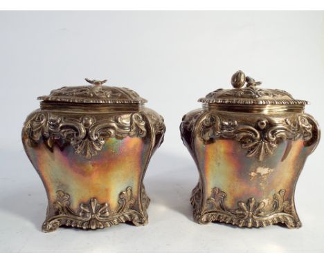 A pair of 18th century silver tea caddies, London 1765, Bombe form with detachable lids, 1 with rosebud finial, 13cms tall, 2