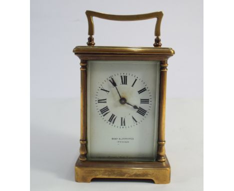Brass French carriage clock with white enamel dial inscribed Bobby Ann Jannings Ipswich