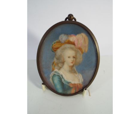 Decorative oval portrait miniature of lady in 18th century dress