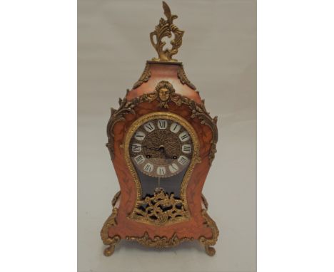 Reproduction French style striking mantel clock in inlaid Kingwood style case with gilt decorations 