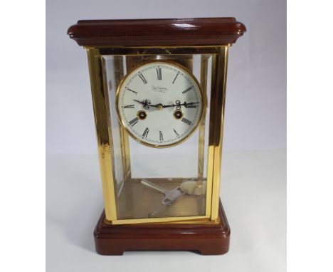 Quality four glass mantel clock with striking movement in mahogany and glazed case 