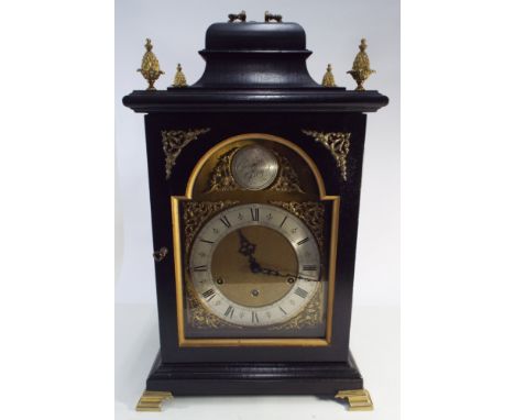 Reproduction chiming and striking bracket clock on 8 bells with brass and silver arched dial in ebonised gilt mounted case 