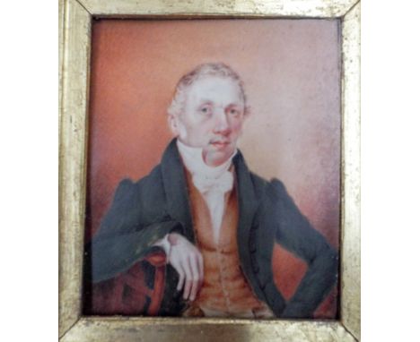 Early 19th century portrait miniature depicting a gentleman in a green coat ivory panel in a swept gilt frame - dated on the 