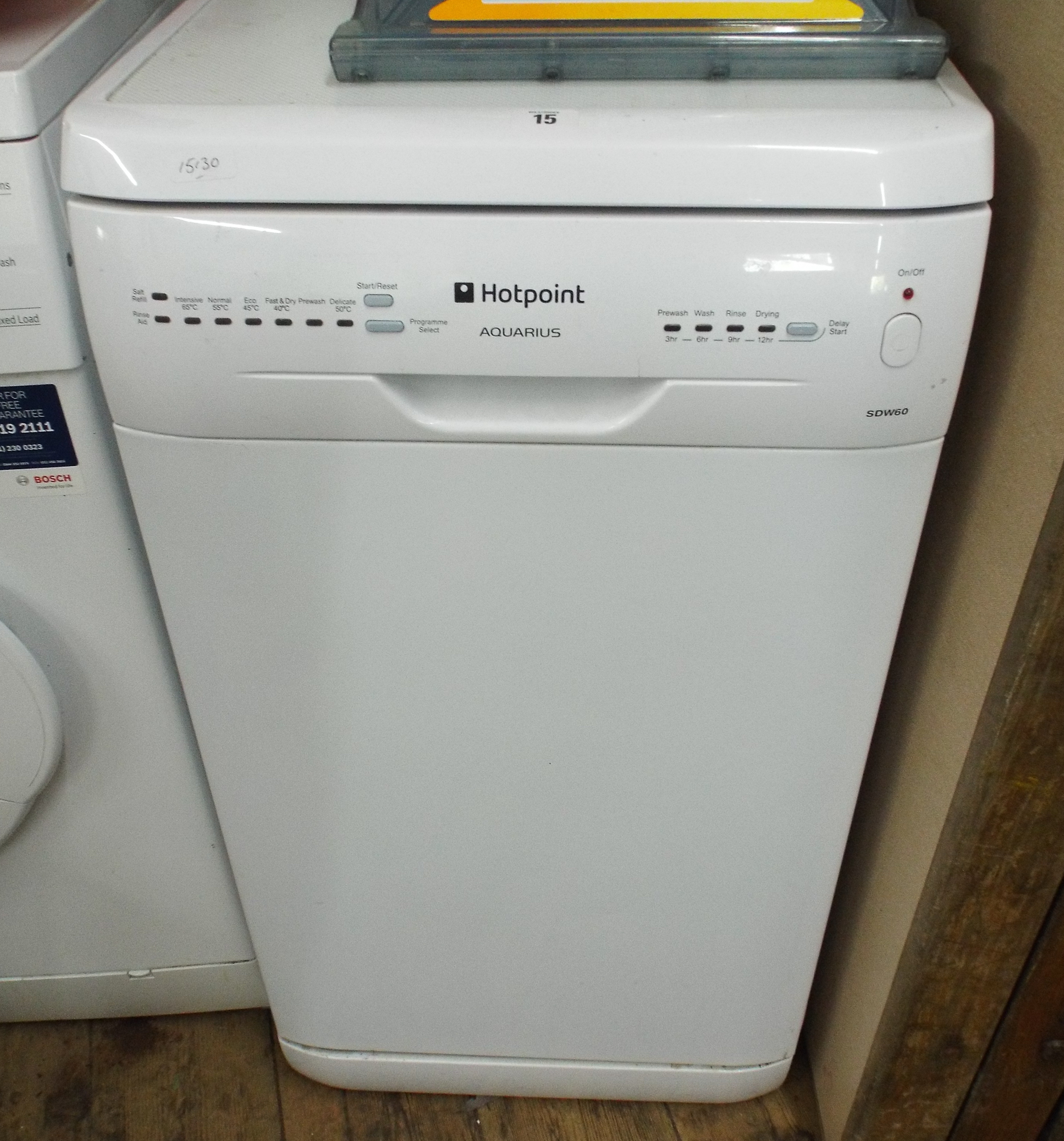 Hotpoint Aquarius narrow dishwasher in white case