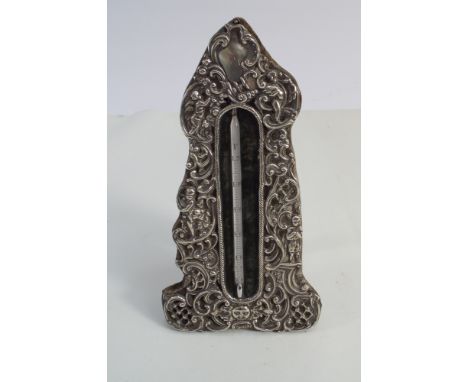 A Victorian silver framed easel thermometer 17cms tall