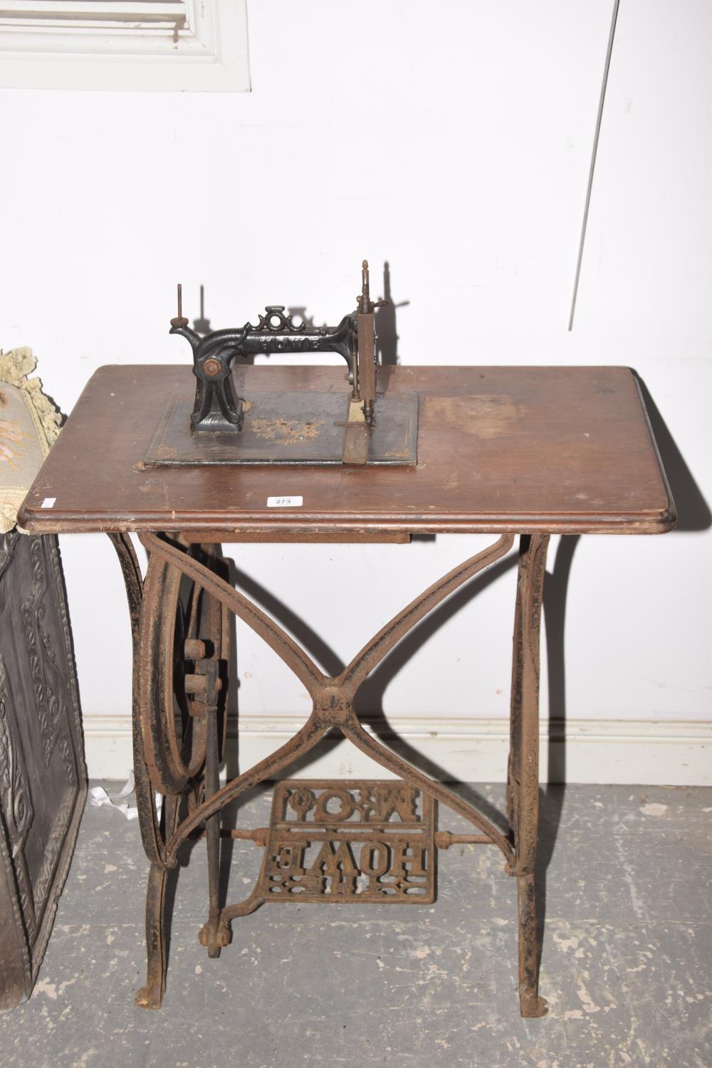 A Late 19th early 20th Century Howe treadle sewing machine.