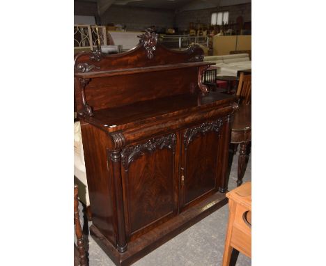 A 19th Century mahogany chiffonier sideboard having a raised single shelf above two cupboard doors on a plinth base. 