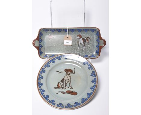 Two Royal Doulton Titanium ware Cecil Aldin platesThe first dinner plate depicting a dog smoking a pipe within foliate blue b