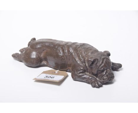 A Doris Linder resin model of a 'Bulldog'The Bulldog modeled in recumbent position with legs outstretched.  Height 5 x 18cm 