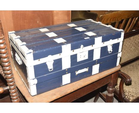 A painted vintage trunkThe slatted trunk with painted metal embellishments and clasp locks, 77cm wide. 