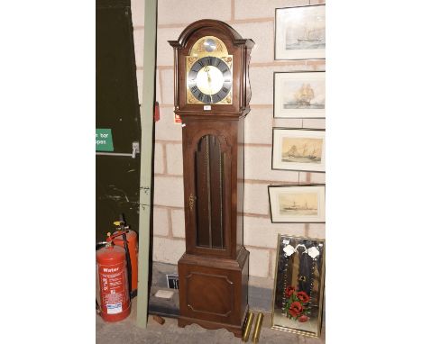 A Reproduction mahogany cased longcase clock complete with pendulum and three brass cased weights. 