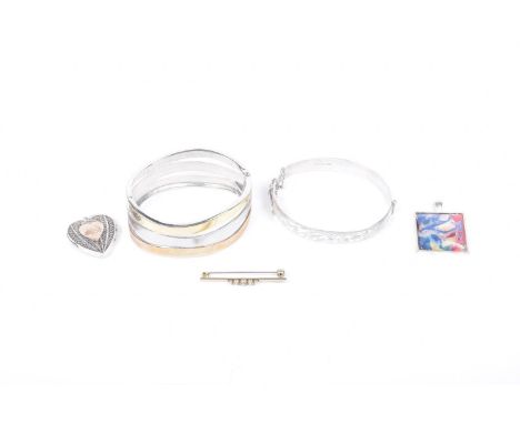 A selection of jewelleryTo include a silver bangle, heart locket, etc. 