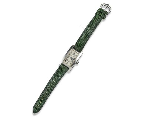A white gold lady's Tank Americaine wrist watch by Cartier, the rectangular white enamel dial with black Roman numerals signe