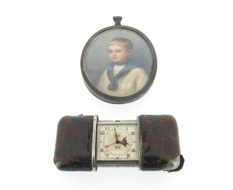 A steel purse watch by Movado, the square dial with calendar chapter and hand with red pointer. Apertures for day and month, 