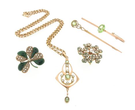 A peridot and seed pearl pendant, the pendant set with two circular-cut peridots and seven seed pearls, and suspending a furt